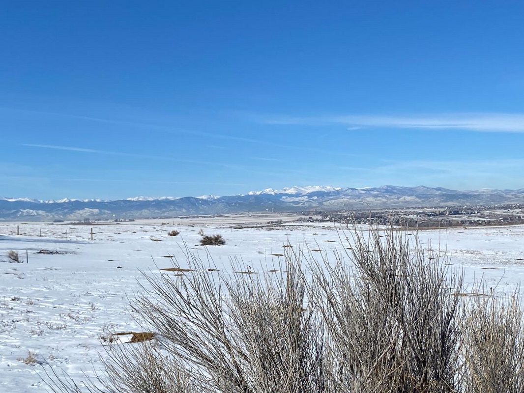 A prairie landscape covered in snow