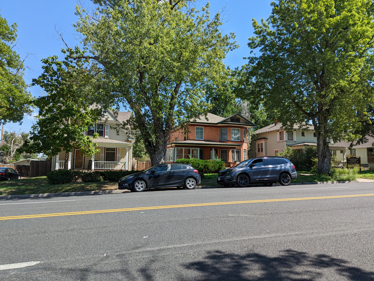 Photo of a row of historic homes in north Cranford neighborhood surrounded by trees